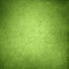 Obraz na płótnie Canvas Vintage green paper with vignette for texture or background, greenery color of the year 2017