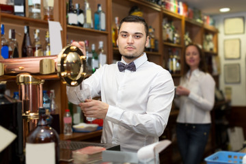 Portrait of young barman