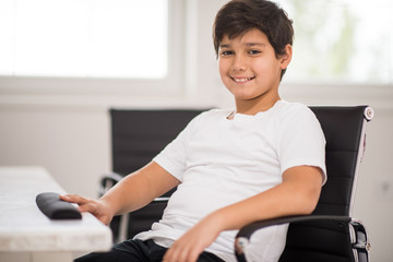 Kid working on computer