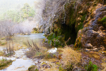 Fototapeta na wymiar Natural waterfall at river Cuervo in winter