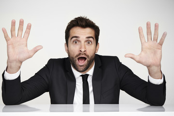 Businessman in surprise, portrait