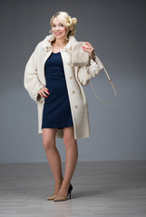  woman in a white coat