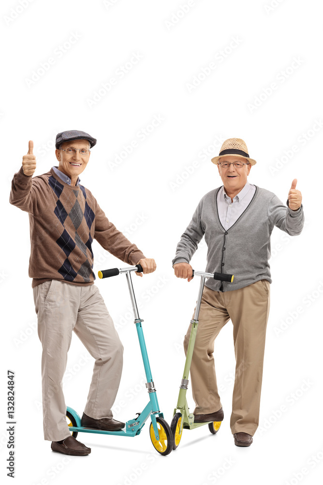 Sticker Two cheerful elderly men with scooters giving thumbs up