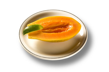 Fototapeta na wymiar Sliced fresh papaya in white background
