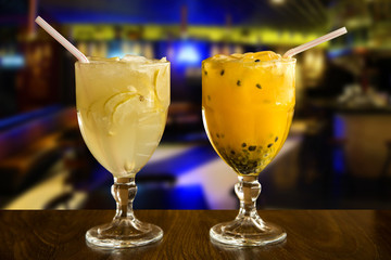 Lemon and Passion Fruit Caipirinha of Brazil on wooden background