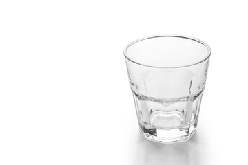 Empty glass cup isolated on white background