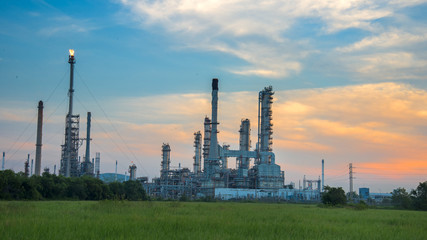 Oil refinery plant at sunrise with sky background, Thailand.