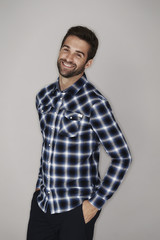 Smiling guy in checked shirt, portrait