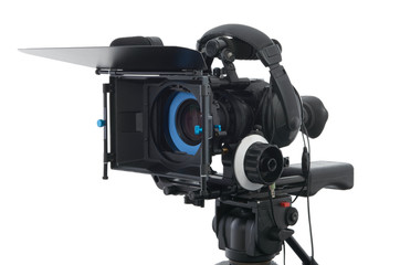 Professional video camera on the white background