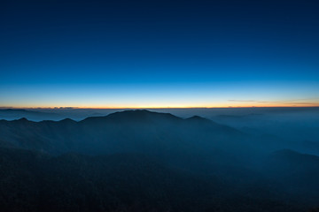 Night mountains before sunrise in Kanchanaburi, Thailand.