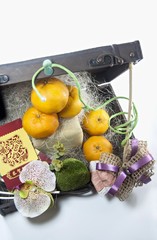 Mandarin oranges isolated on vintage background with tag Gong Xi Fa Cai
