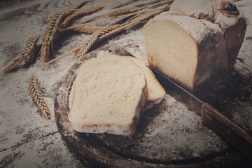 Bakery concept background. Toast sliced bread and knife