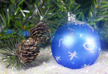 Fototapeta na wymiar New Year's ball on a decorative snow