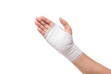 Injured painful hand with white gauze bandage. isolated on white