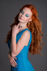 Naklejka premium young woman with red hair.