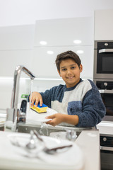 Child in modern white kitchen