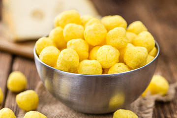 Cheese Balls on vintage wooden background