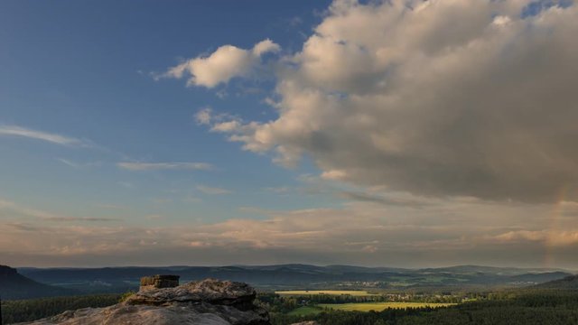 4k UHD huge cloud with rainbow time lapse 11410
