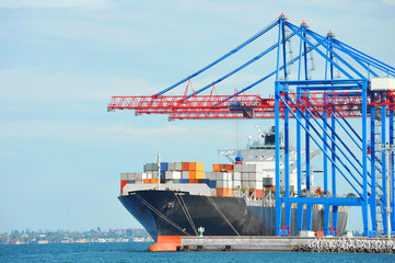 Cargo crane and ship © Unkas Photo