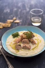 Cooked salmon bites with pure