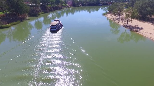 Aerial footage of classic historical vintage paddlesteamer (PS Melbourne) on Murray River

