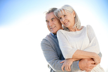 Portrait of senior couple embracing each other