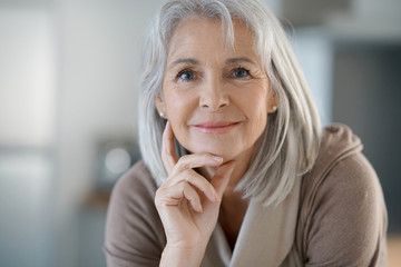 Portrait of beautiful senior woman with white hair
