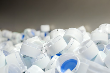 White caps of plastic bottles