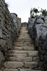 Fototapeta na wymiar Stone Stairs And Walls Machu Picchu Peru South America