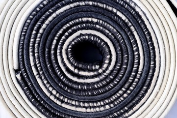worn white and black belt in martial arts