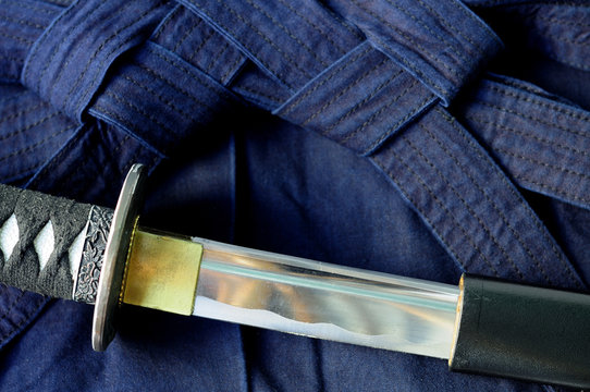 Blue Hakama And Japanese Katana Sword Sports