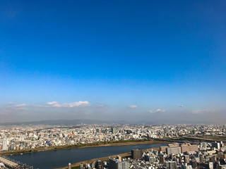 Osaka sunset to night amidst the winds of change