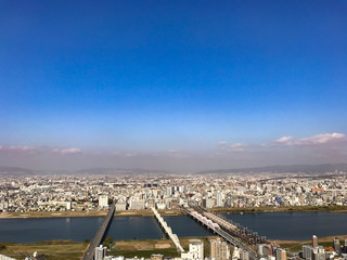 Osaka sunset to night amidst the winds of change