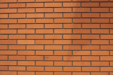 Brick wall texture background. Orange bricks grunge pattern.