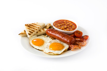 Traditional full English breakfast with fried eggs, sausages, beans, mushrooms, grilled tomatoes and bacon isolated
