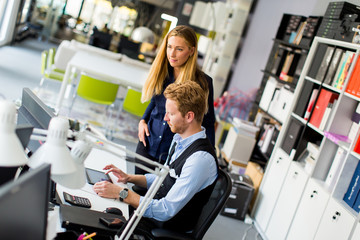 Fototapeta premium Business couple using laptop