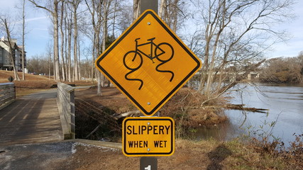 Slippery when wet bike sign