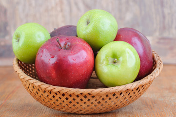 wicker basket full of fresh apples