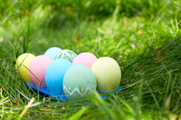 Easter eggs on green grass. Easter holidays concept