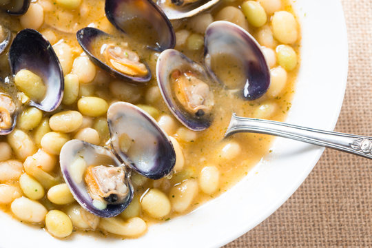 White beans with clams called "pochas" in Spain