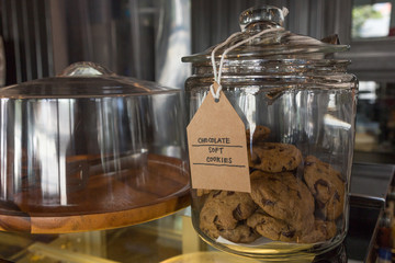 Chocolate chip soft cookies in a glass jar