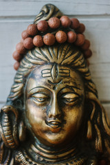 Fototapeta na wymiar Hindu God - Shiva with rudraksha rosary on the head.