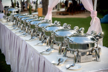 Buffet Table with Row of Food Service Steam Pans