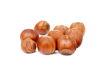 Group fresh hazelnuts isolated on white background