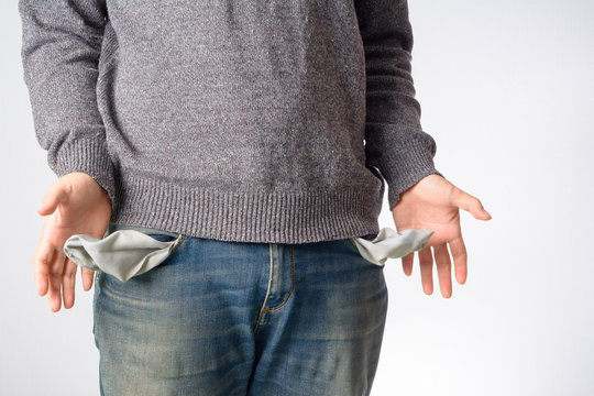 Man show empty pocket.