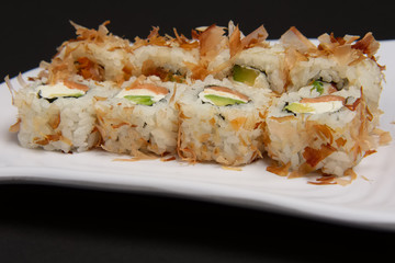 Closeup of bonito rolls served on plate.