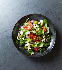 Mediterranean-style salad with green olives and feta