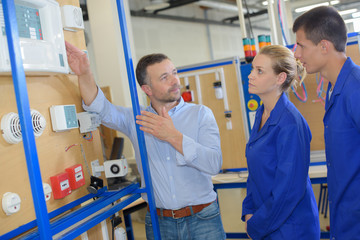 Man showing selection of alarms to students