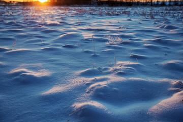 Snow drifts at dawn. bizarre forms snowdrifts.