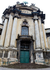 Fototapeta na wymiar Ancient monument - facade of medieval church in Lviv Ukraine
